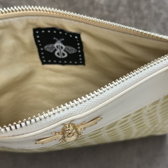 Bumble Bee clutch with wrist band. Color cream. Faux reptile design. Zip top - Picture 8 of 8